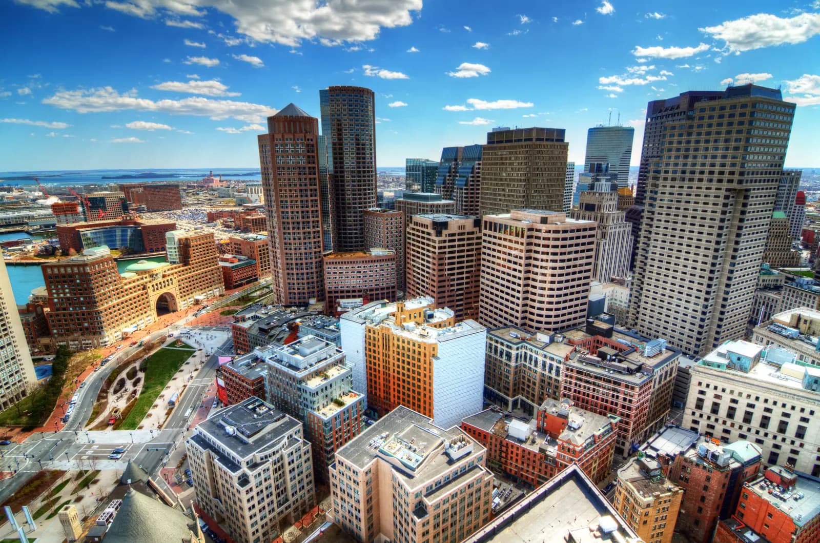 Aerial view of downtown Boston and the Financial District beside Boston Harbor